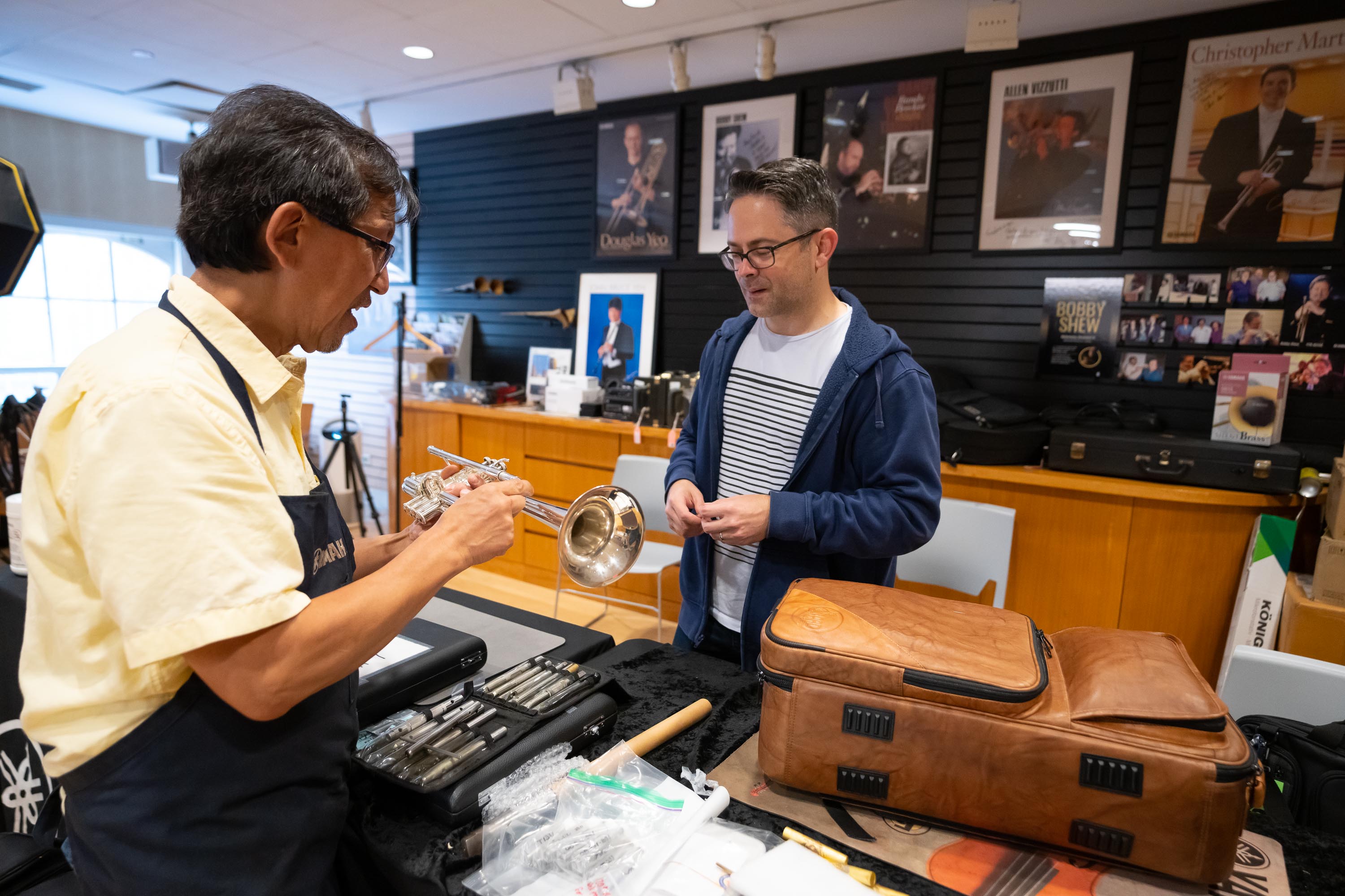Anthony Prisk takes advantage of some free time before he has to return to the airport by visiting an instrument shop in New York City