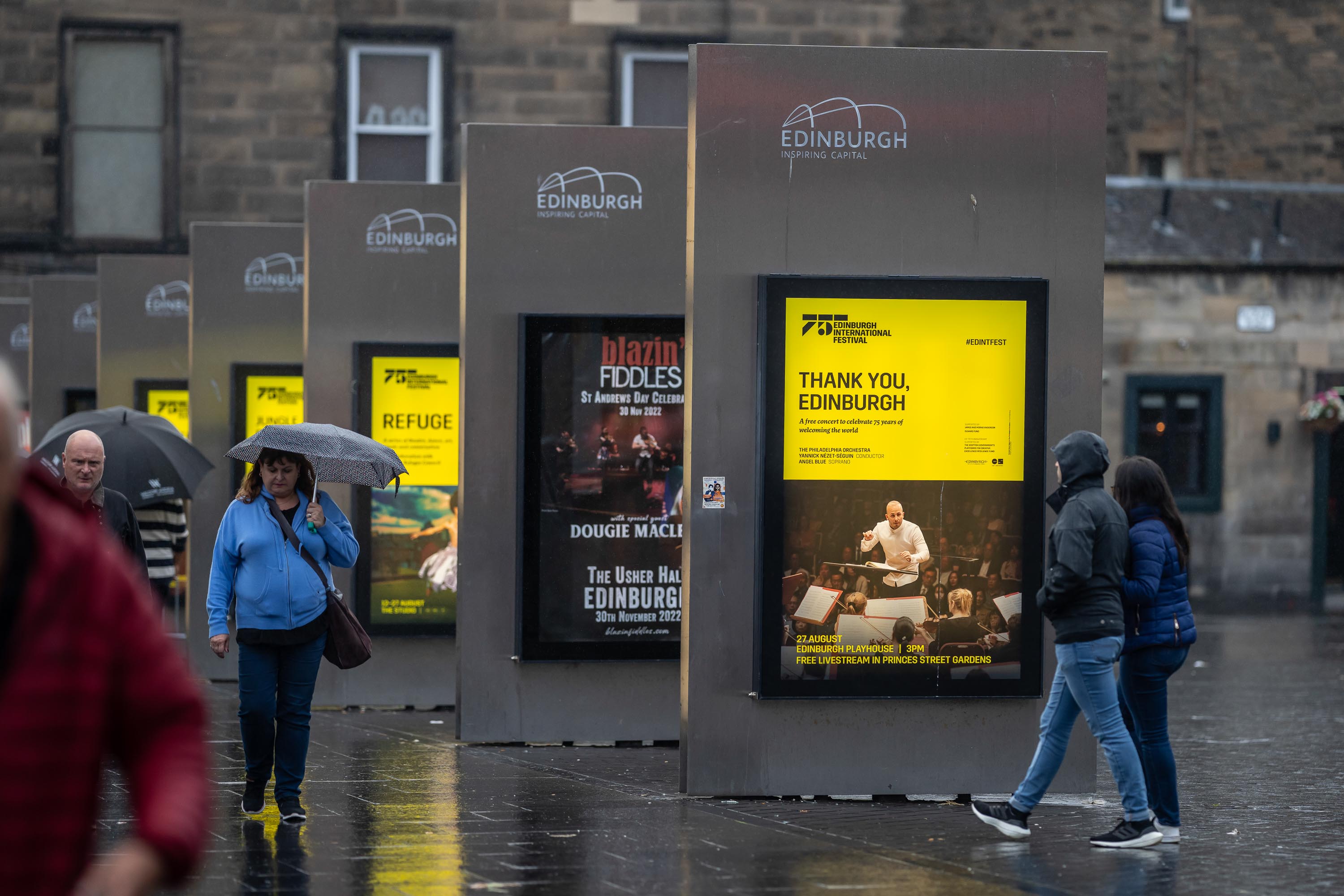 Outside Usher Hall are posters for upcoming events, including the Orchestra’s final concert