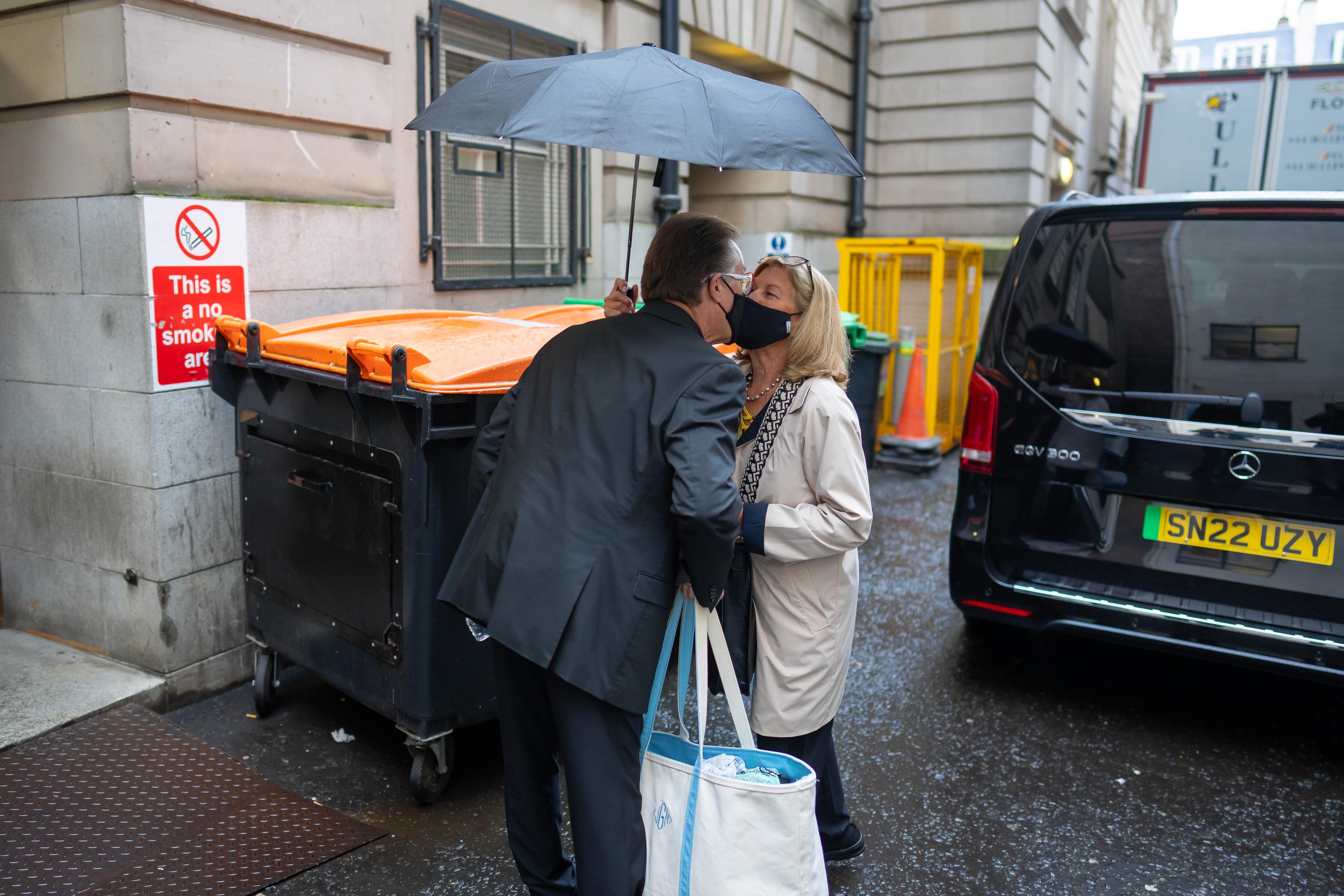 Principal Bass Harold Robinson, who will retire from the Orchestra following the tour, kisses his wife, Janet, goodbye before entering the stage door at Usher Hall