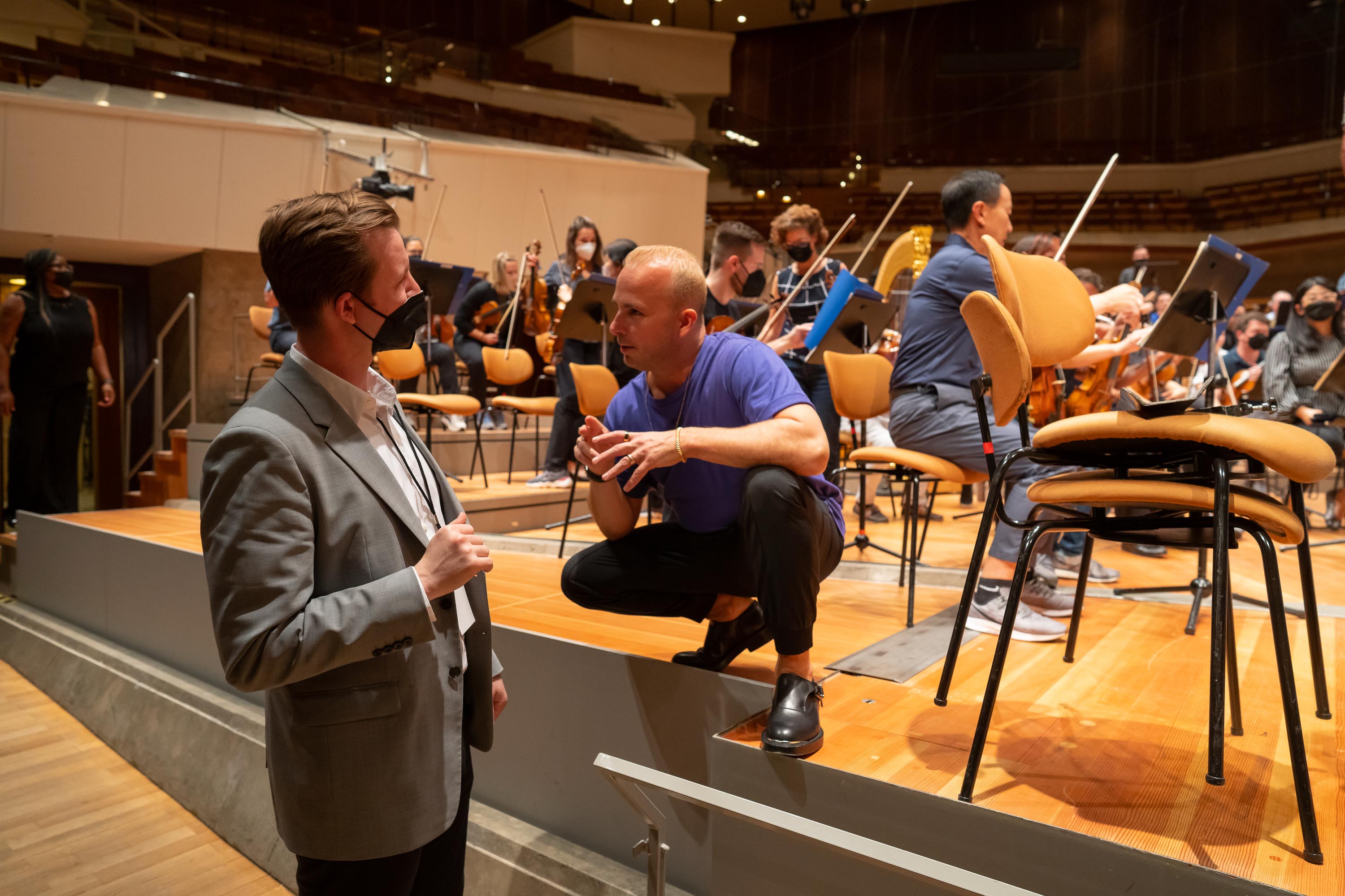 Music Director Yannick Nézet-Séguin and Conducting Fellow Tristan Rais-Sherman confer during the sound check