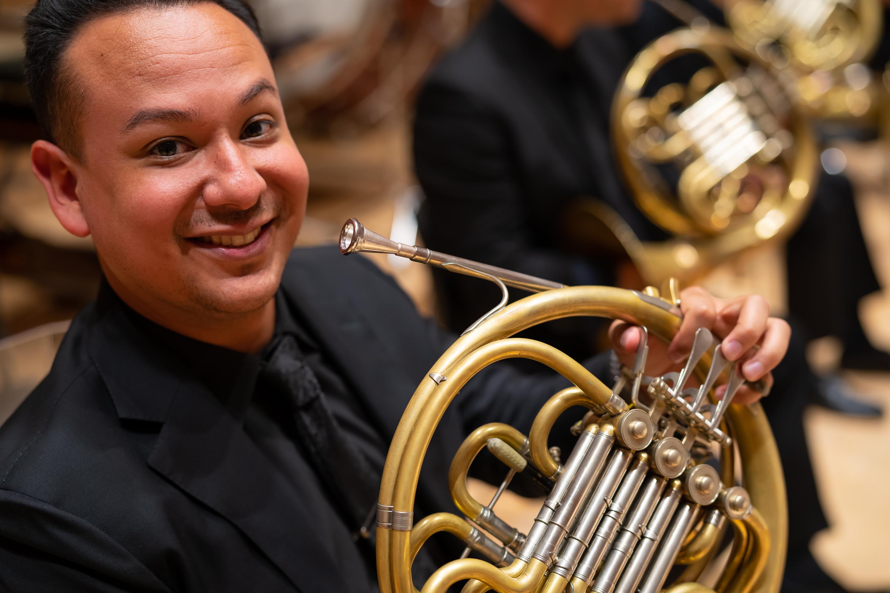 Horn player Ernesto Tovar Torres is ready for the concert
