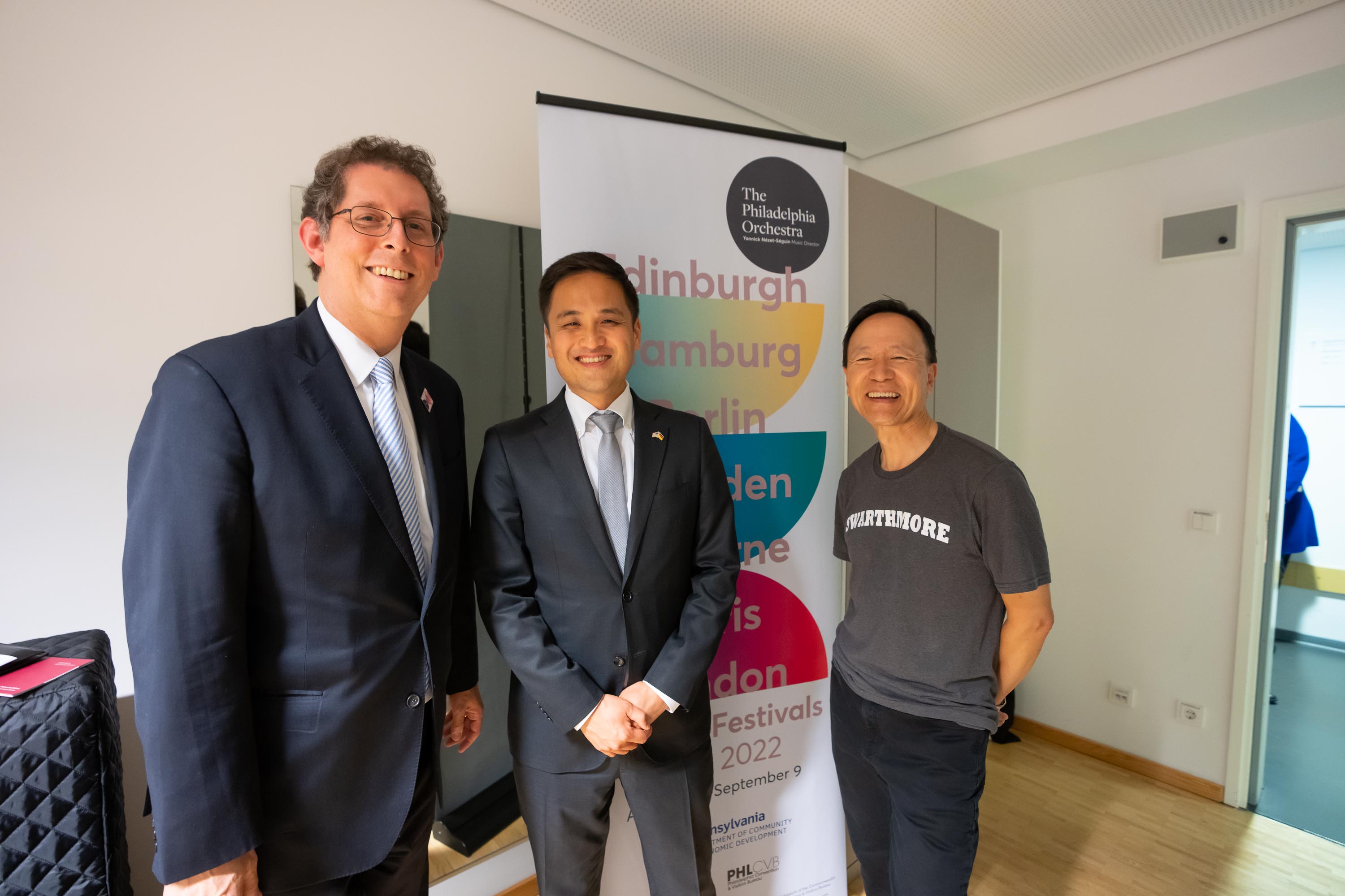 Philadelphia Orchestra and Kimmel Center, Inc., Executive Vice President Ryan Fleur (left) and Concertmaster David Kim (right) meet backstage with Consul General in Leipzig Ken Toko