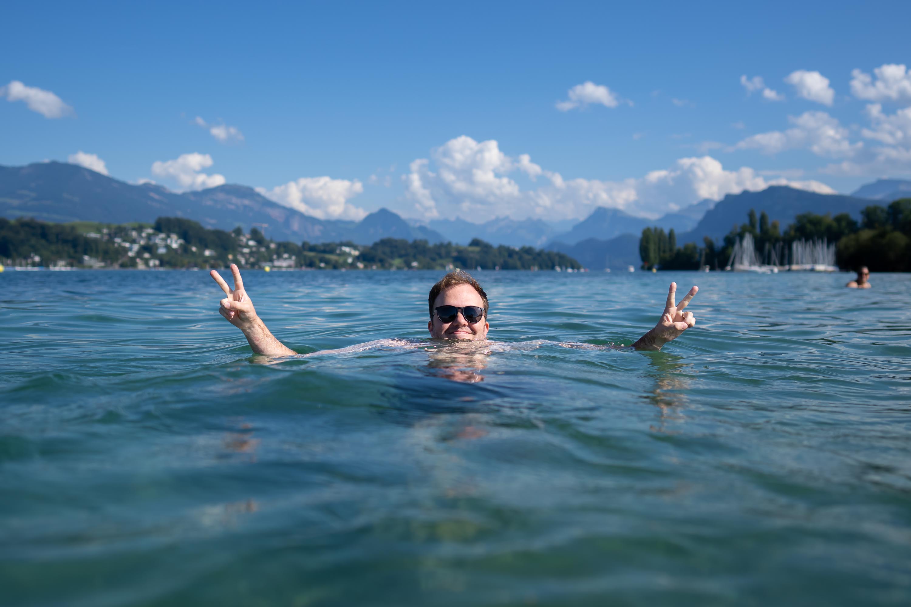 Associate Principal Flute Patrick Williams takes a dip in the refreshing water of Lake Lucerne